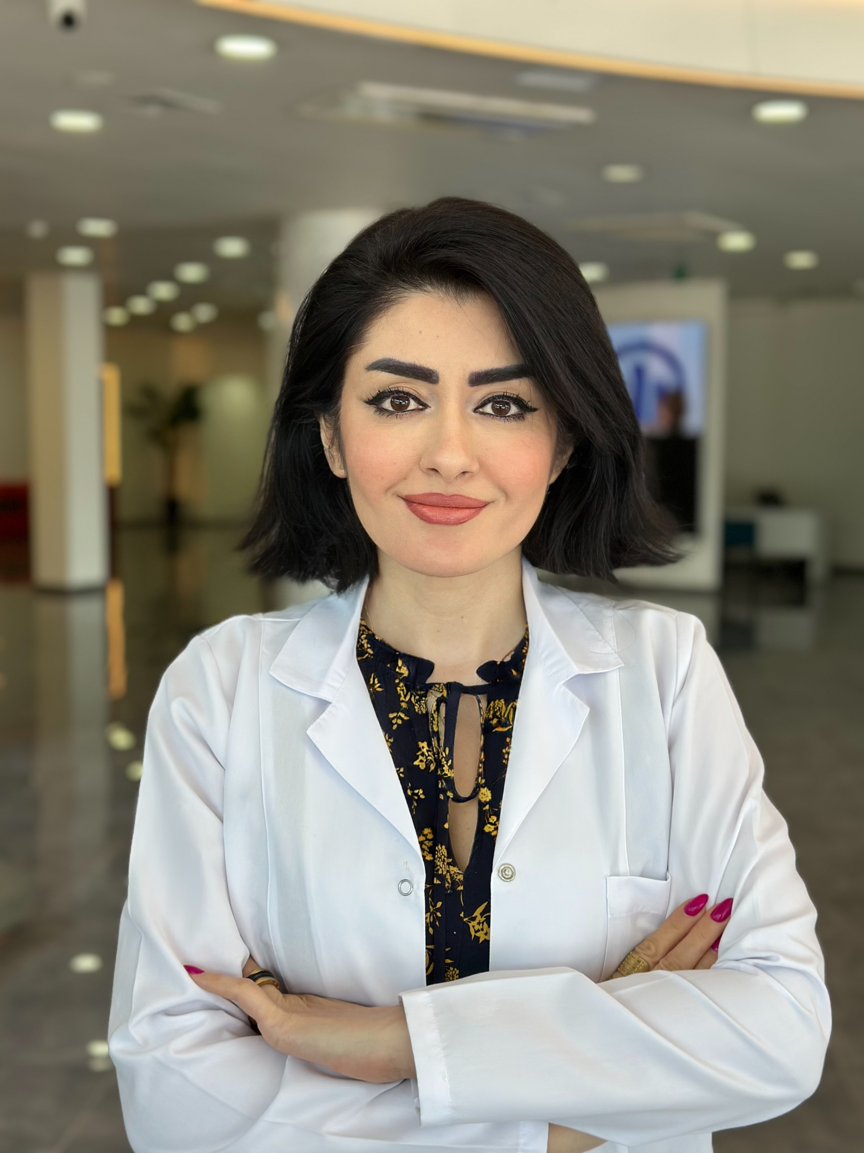 Dr. Mina Afiat